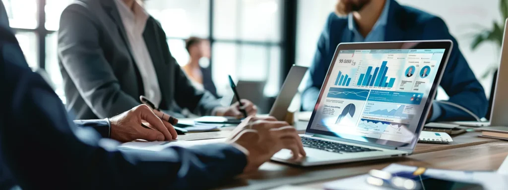 a professional business team presenting services with a laptop open on a desk with a linkedin page displayed on the screen.